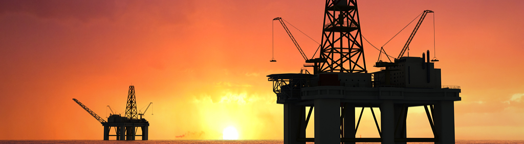 oil and gas rig in sunset